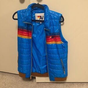 Women’s medium blue with stripes aviator nation vest